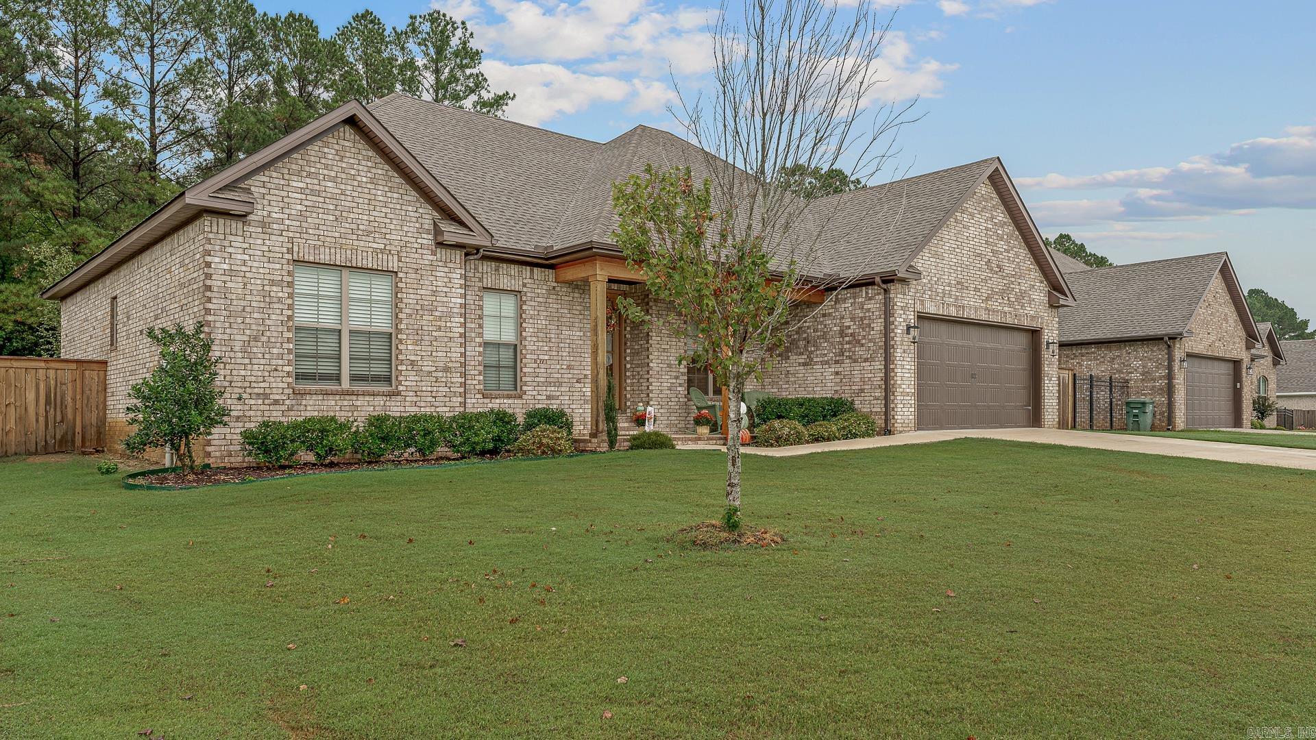 Welcome to 210 Gulley Drive a stunning 4-bedroom, 2-bath home in the highly desirable Gatlin Crossing at Whispering Hills subdivision in Brookland, Arkansas. From the moment you arrive, the stone exterior and inviting curb appeal set the tone for what's inside: a beautifully designed, move-in-ready home with space to live, work, and entertain. Step inside to an open, light-filled floor plan featuring warm hardwood floors, a spacious living area perfect for gatherings, and a kitchen built for cooking and connection. The primary suite offers a private retreat with a comfortable layout, while the additional bedrooms provide flexibility for family, guests, or a home office. Outside, the 0.29-acre lot delivers just the right amount of yard space for play or relaxing evenings without overwhelming maintenance. Located in the sought-after Brookland School District and just minutes from Jonesboro's shopping, dining, and conveniences, this home blends modern comfort with small-town charm. Don't wait, homes like this in Gatlin Crossing move fast.