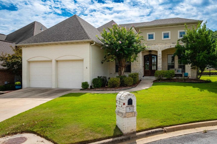 Nestled behind the gates of the exclusive Hickory Grove neighborhood, this custom built home is a rare treasure. Wonderful Office, Large windows, tall ceilings, 8 foot doors, hardwood floors, lots of natural light and an open floor plan create an inviting ambiance, making this single-level residence an entertainer's dream. Spacious kitchen island with bar stool seating and butler’s pantry across from the pantry with ample storage. The two spacious guest bedrooms share a bathroom, both with walk in closets.  The primary suite is a sanctuary of luxury with a soaker tub, his and her sinks, separate glass shower, private water closet and his/her closets. The tranquil sounds of the water feature behind the house are enhanced by the homeowner’s association, ensuring meticulous maintenance of gates, streets, common areas and the grounds of each home in the neighborhood. The two-car garage has a textured floor and ample storage make this single-family home a unique find. SEE AGENT REMARKS