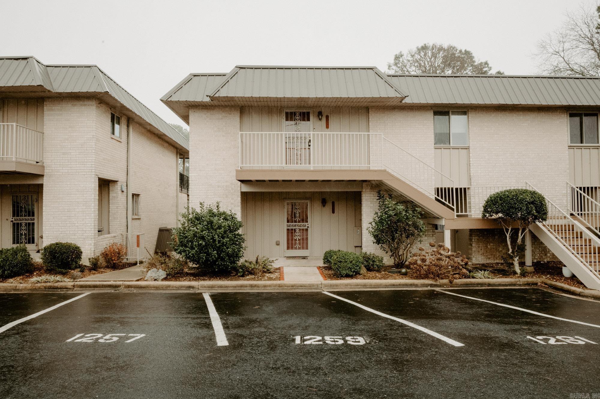 This 2-bedroom and 2-bath condo could be your next investment or your own getaway to Lake Hamilton just minutes away from Central Avenue. Located just off Higdon Ferry. Roof was just replaced in the Summer of 2023. Complex allows quarterly rentals in this private gated community. Home is coming to the next buyer fully furnished. Beds, refrigerator, decorations on the wall, living and dining rooms furniture and outdoor furniture that overlooks Lake Hamilton. You'll have a boat slip and complex has a community room and swimming pool at the point overlooking the lake. SEE AGENT REMARKS!
