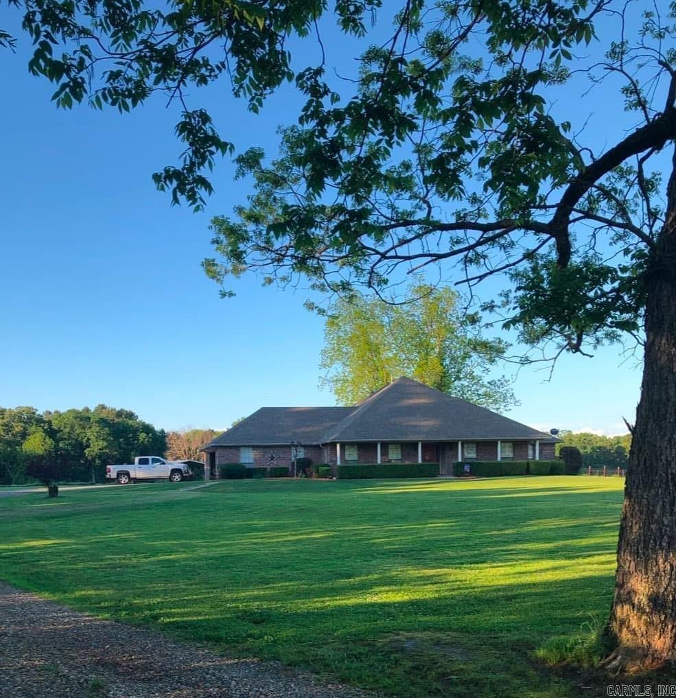 Beautiful home on 4.38 acres inside the city limits of Texarkana, AR. Custom built for the owners in 2002. This home features an open floor plan, huge family room opening to kitchen w/ breakfast bar and island. Off the kitchen is a walk-in pantry & very spacious laundry room with hanging rack, sink, ironing board built in & lots of storage space. Thereās also a nice breakfast area w/ windows offering a view of the back yard. A screened patio is accessible from the breakfast room & opens to a patio. There is a gas connector on the patio if you wanted to connect a gas grill or gas logs for outdoor entertaining. Near the entry is an office w/ built in gun closet. All bedrooms are very roomy w/ nice size closets. The guest bath is easy access to the living area & the 2 extra bedrooms. On the back of the house, is the beautiful & roomy main suite. It has a private bath w/ a walk-in shower, 2 nice walk-in closets, a jetted tub & a vanity with sitting area. Roof was replaced in 2008. It was checked out by Langford Roofing in 2024. The roof was also soft washed in 2024. Kitchen was updated with new granite, farm sink & new stainless steel appliances in 2021. New carpet 2021 in bedrooms.