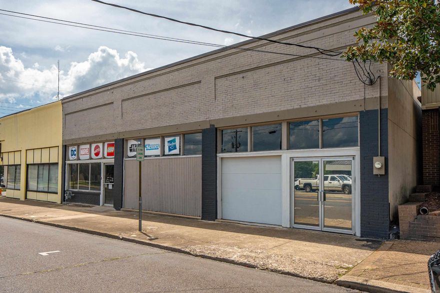 A fantastic opportunity to acquire a versatile and well-maintained commercial property situated in a high visible area with significant foot and vehicle traffic. Spanning 4,872 square feet, this property combines historic charm combined with recent upgrades, making it a perfect foundation for a variety of business ventures or redevelopment projects.  Recent roof in 2023, updated electrical in 2019 and two HVAC units (2021 & 2022). Whether you are an investor seeking a turnkey property or an owner looking to expand with great frontage, this property offers excellent potential and a layout for endless possibilities.