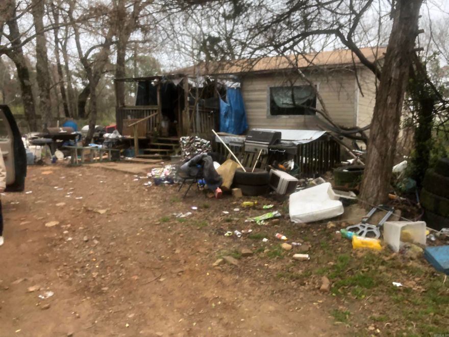 AS-IS/WHERE-IS. Great cottage style home situated on a half an acre.  With some TLC this could be a great place to call home. No seller property disclosure. Agents see remarks. Seller will give a credit for the trash out.