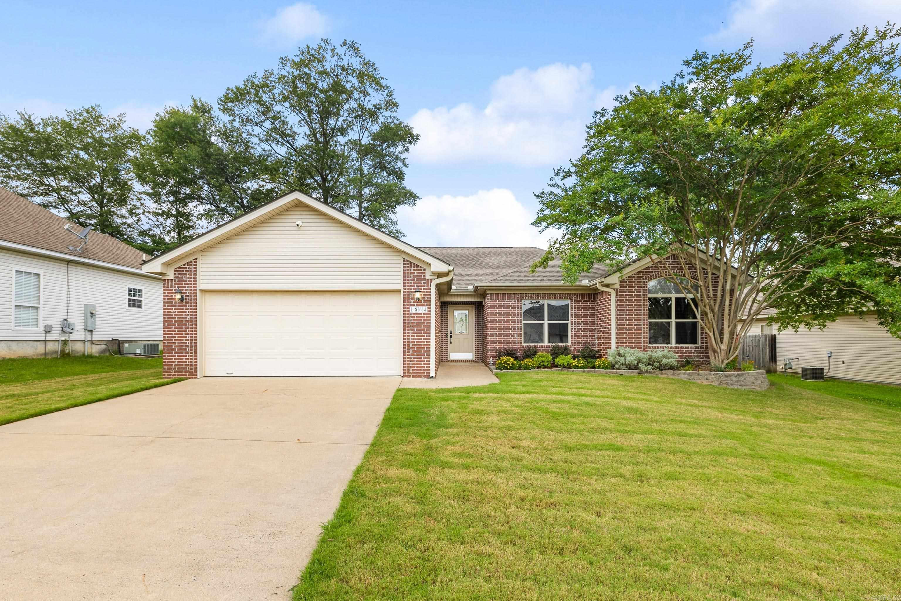 Welcome to 1864 Falcon Way – a meticulously maintained and thoughtfully updated 4 bed, 2 bath home nestled in the highly desirable Eagle Point Subdivision of Benton. With modern conveniences, stylish finishes, and fantastic curb appeal, this move-in ready gem offers the perfect blend of comfort and functionality. Step inside to discover fresh paint and durable luxury vinyl plank flooring throughout, creating an inviting space. The kitchen is a dream, boasting all-new stainless steel appliances conveying, touch-activated faucet for hands-free convenience, and freshly painted cabinets. Front door has a WiFi-controlled digital door lock for added peace of mind. Enjoy cozy evenings by the gas log fireplace in the spacious living area, or take your entertainment to the next level with wired surround sound, ready for your setup. Both bathrooms are well-appointed, and all bedrooms offer generous space and natural light. Additional highlights include: ring security system, WiFi controlled sprinkler system, French drains, backyard storage shed with electricity, built-in utilities shelves and a wired heater in the garage, New roof in 2018, and an HVAC original to the house.