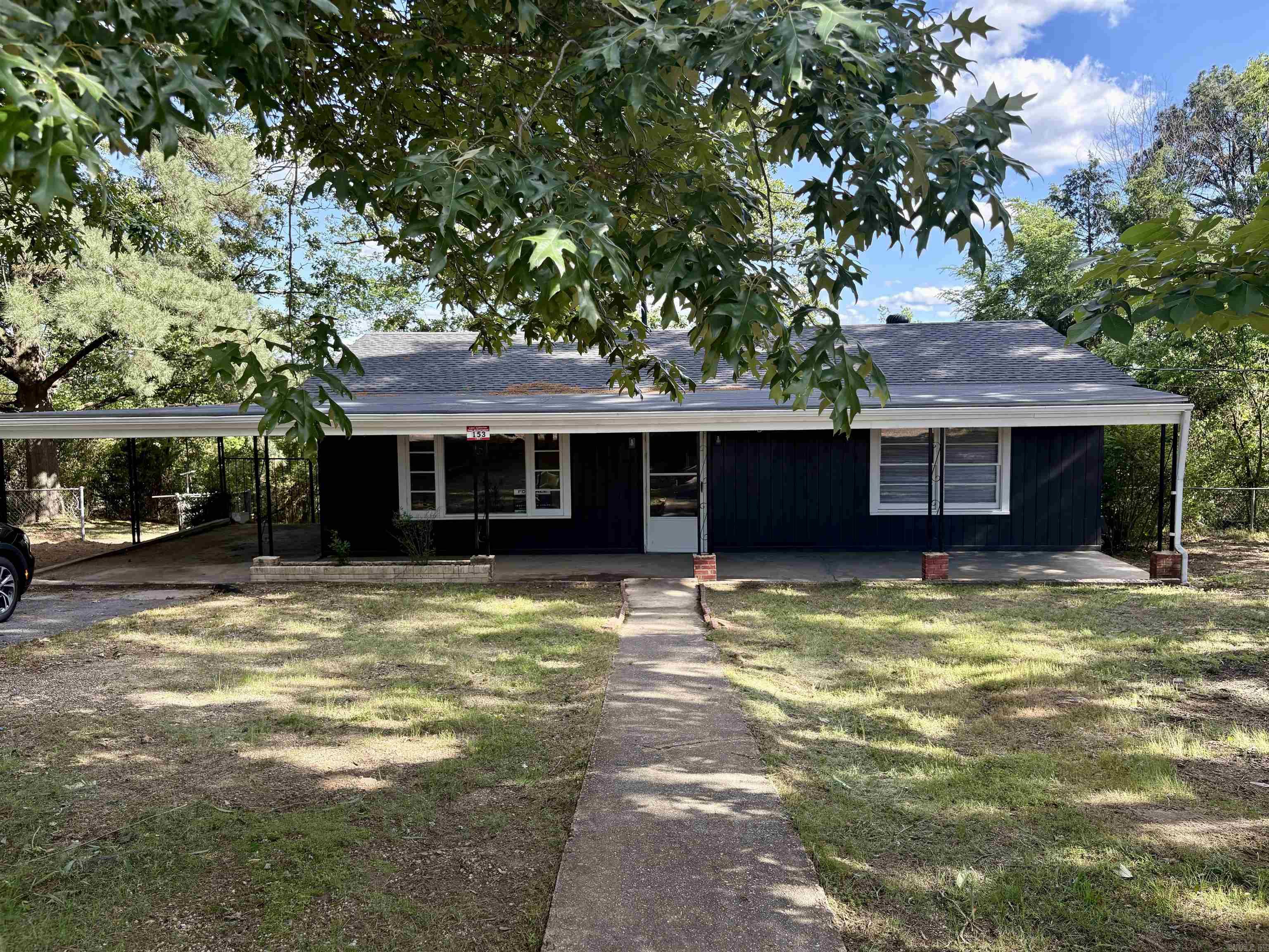 This recently renovated home is in an incredible central location in Hot Springs, just minutes from everything the area has to offer. Located in the sought-after Lakeside School District, it boasts numerous recent updates and large, comfortable bedrooms filled with natural light. Fresh interior and exterior paint create a bright, welcoming feel throughout. The fully updated kitchen features new cabinets and sleek countertops. Recent upgrades include luxury vinyl plank flooring in select areas, a new HVAC system, and a new roof—bringing peace of mind and modern efficiency. Enjoy the fenced-in backyard, ideal for pets or play, and a covered porch with scenic mountain views in the fall. Move-in ready and full of value, 153 Pinehill Rd is a must-see.