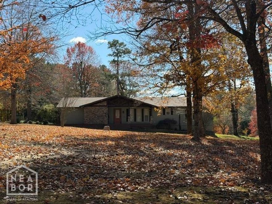 Enjoy 8.5 acres with this beautiful 4-bedroom 3.5 bath home. Featuring a vaulted ceiling screened in porch with gas fireplace overlooking fully stocked pond.