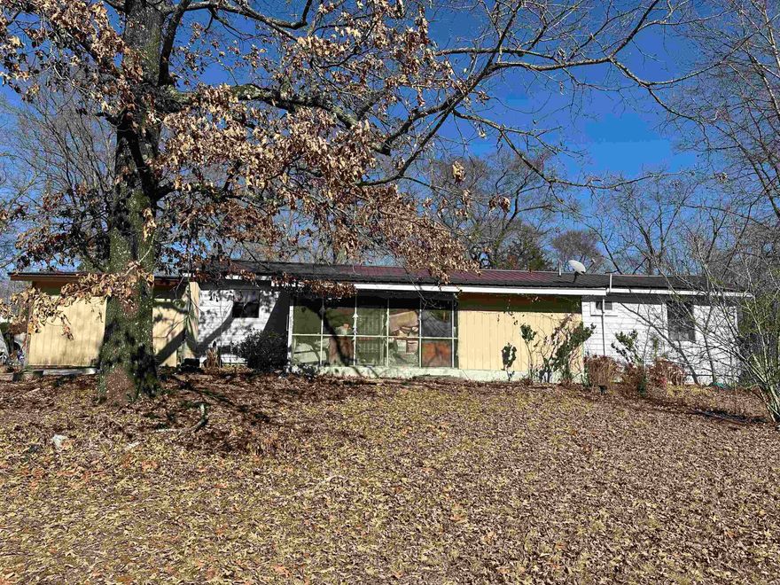 Here is your opportunity!  3 bedroom 2 bath home on 2 acres priced under $100,000!  New metal roof in 2020 takes care of a big expense! New bathroom vanity, carpet, and other items are already purchased and ready for someone to finish the project! A shop and several outbuildings are included with this property, including a storm shelter! Not far from the Ouachita National Forest, ride to Wolf Pen Gap and other nearby ATV trials, close to hiking and the new mountain biking trails in Mena! Property is being sold AS IS, including most items currently there, inside and outside. Subject to prior reservation of 1/3 mineral rights.