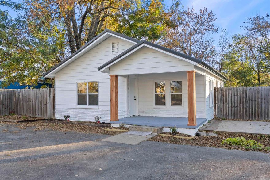 Welcome home to this beautifully remodeled farmhouse set on almost 1/2 acres in Enola. Enjoy the charm of classic farmhouse details blended with modern updates. Improvements include new windows, new metal roof, new paint, new flooring, new gas stove and dishwasher, new water heater, new lighting, new duct work for HVAC. Central heat and air and a wall gas heater. Also includes 8x28 metal container shop recently repainted. Whether you want to relax in your spacious back yard with a wooden privacy fence or walk next door to the local store this property offers move-in-ready convenience! Possible for some buyers to obtain 100% Financing!  Agents see remarks.