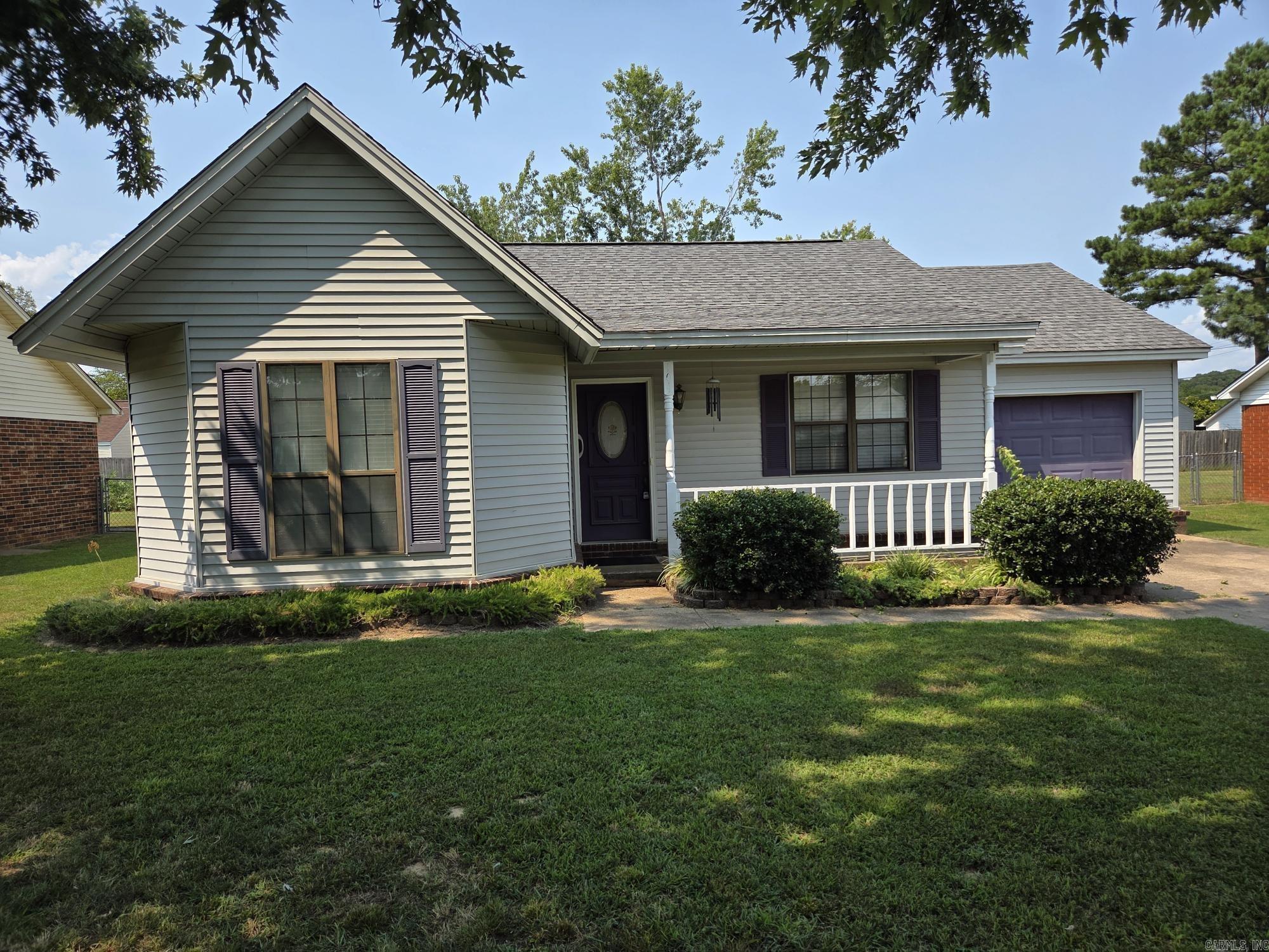 Nice cozy 3 bed, 2 bath with a one car garage. Fenced on 3 sides & a small storage building & patio in the back. this house is located on a low traffic one block long street just inside Searcy city limits. This house has a main bedroom with attached bath that has a walk-in shower with seat & walk in closet. Architectual shingles were replaced about 8 years ago. Water heater was replaced in 2023. The refrigerator, washer & dryer can stay with a great offer. Extra storage room behind the garage. This house has basically maintenance free exterior, but some rooms need some fresh paint inside. Great neighbors! Sellers are licensed Realtors. See agent remarks.