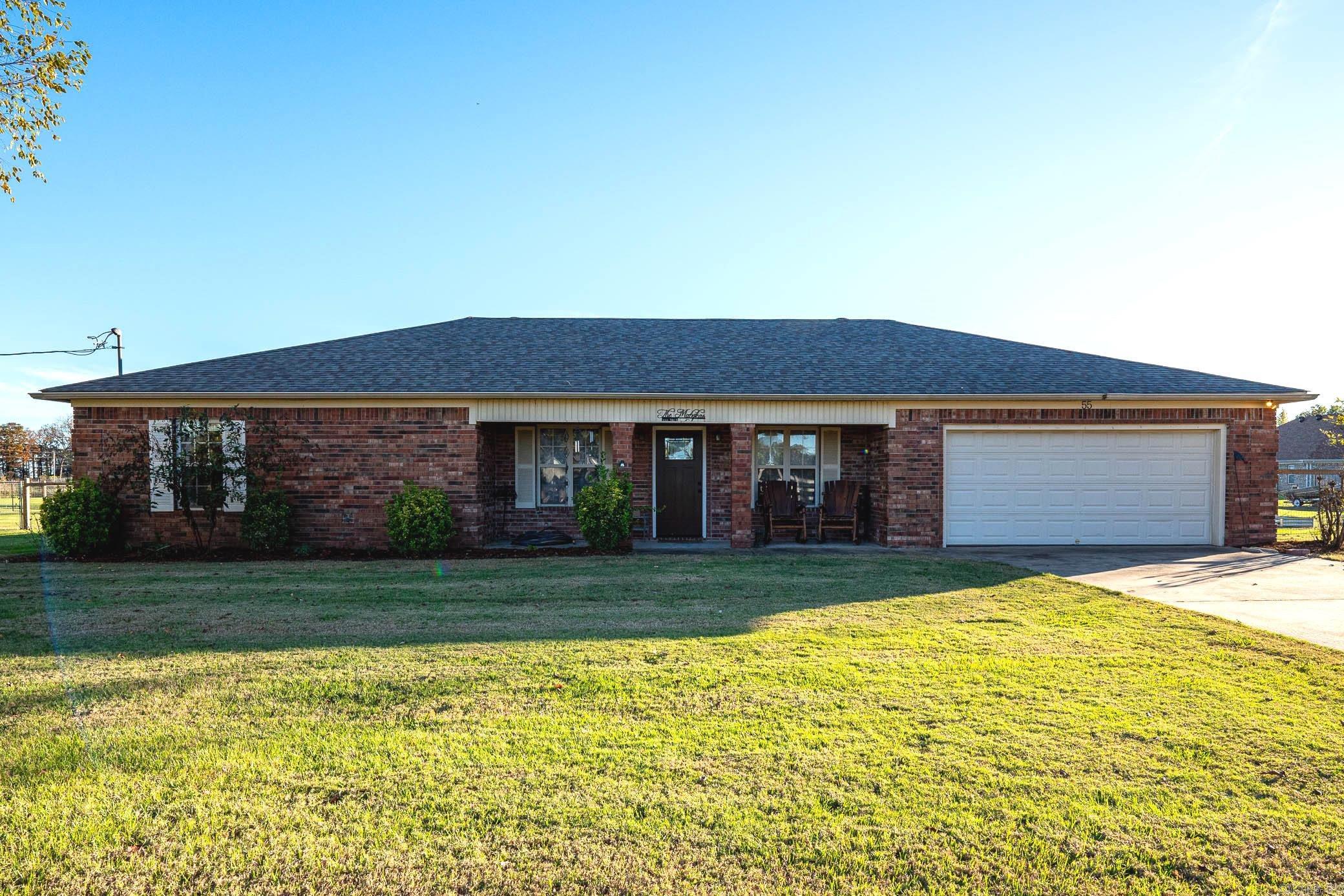 Experience serene country living with easy access to city conveniences in this charming home, perfect for commuters seeking a peaceful retreat. Set on a spacious 0.75-acre fenced lot, this property offers ample outdoor space. Inside, the large kitchen/dining combo is an entertainer’s dream, featuring under-cabinet lighting, a new backsplash, and convenient slide-out drawers in the pantry cabinet. A built-in buffet/coffee station adds both functionality and style to the space.  The flexible layout includes a versatile room that can serve as a home office, formal dining room, or cozy den, allowing you to customize the home to fit your lifestyle. The living room is expansive, with a tray ceiling adding an elegant touch, while a new front door welcomes you with warmth and charm.  The primary suite offers a spacious walk-in closet and a luxurious bathroom with a jacuzzi tub for ultimate relaxation. A water purification system ensures quality drinking water. This home combines the best of country living with modern amenities, offering a perfect blend of tranquility and accessibility.