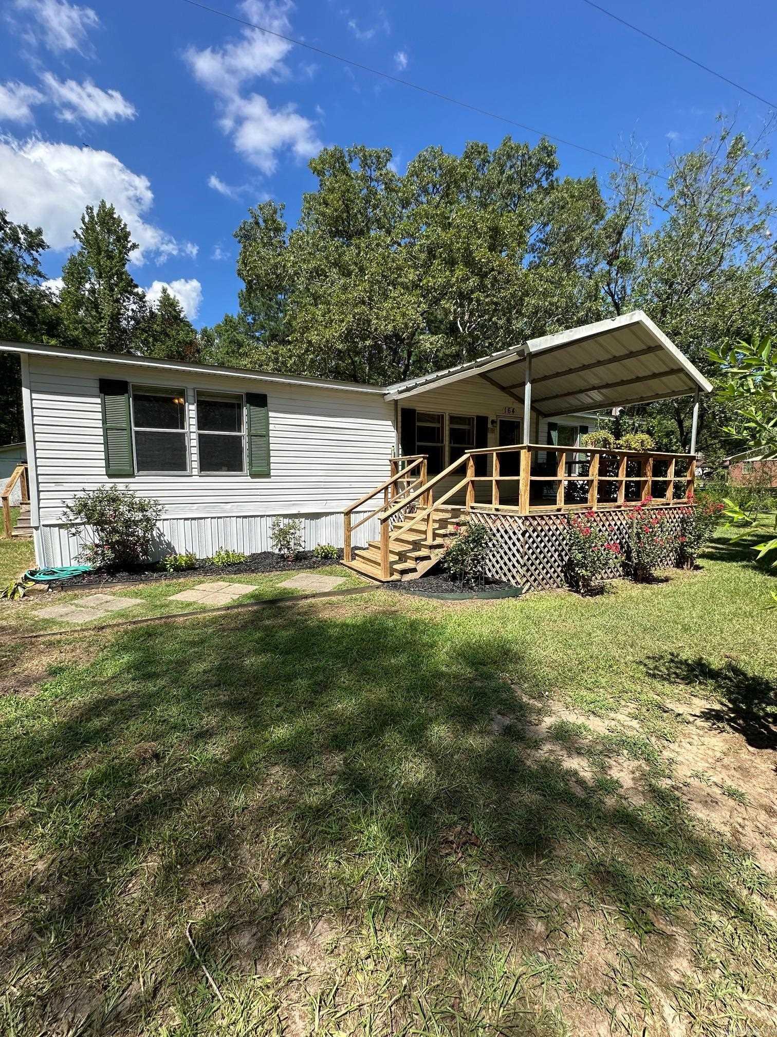 If you are looking for an affordable home that is move in ready, here is one for you!! This home has only had one owner which is always nice. It sits on a nice lot that is beautiful with plenty of flowers and trees. The primary suite is roomy and has a double vanity in the bathroom and a soaking tub! With the two other bedrooms on the other side of the home it makes for more privacy. This home has an adorable and bright kitchen with a large island! Outside you will find a special covered deck and a large backyard with a great shop! Make an appointment and see this one today. ***Sellers are offering $5,000.00 flooring allowance. ***OUACHITA SCHOOL DISTRICT