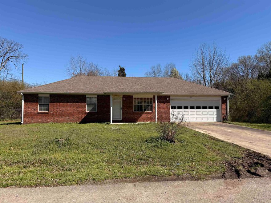 Adorable 3 bedroom, 2 bath home on a large fenced lot! Features a 2-car garage, brick and siding exterior, and new stainless steel appliances. See Agent Remarks