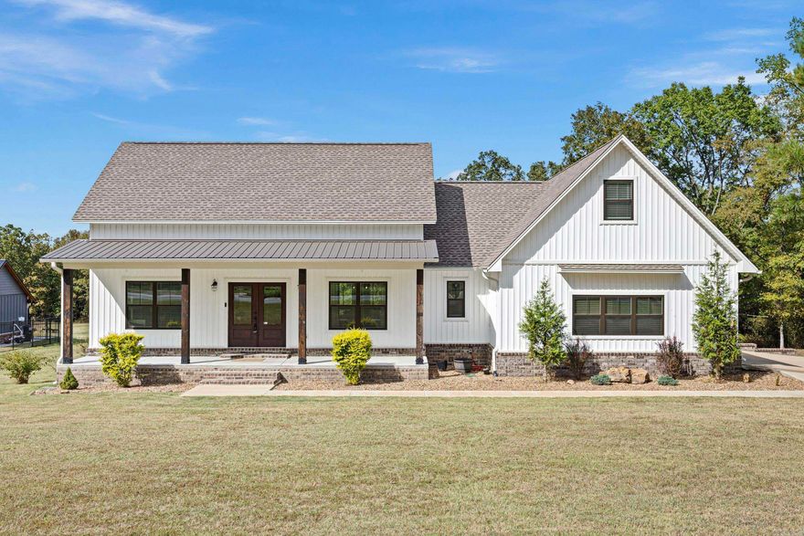 Nestled on over an acre of serene land, this charming 4-bedroom, 3-bath home perfectly balances comfort and style. The split floor plan offers privacy, making it ideal for families or guests. Each bedroom is generously sized, and the large walk-in closets provide ample storage—what a dream for organizing clothes and treasures alike! As you enter, you'll appreciate the warmth of the fireplace, inviting you to cozy up on chilly evenings. The heart of the home seamlessly flows into the spacious living area, ideal for entertaining friends or spending quality time with loved ones. Natural light floods the space, creating an uplifting atmosphere. Let's set up a showing today!