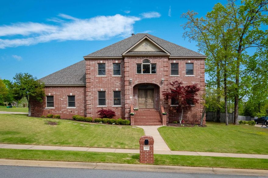 NEW ROOF 2025; one HVAC replaced 2022. Stunning all brick home on a large corner lot in the coveted Sezanne neighborhood of Chenal near The Promenade. Beautiful hardwood floors and a two story foyer greet you as you enter. An office or formal living room is on one side and a formal dining area is on the other side of the sweeping staircase. The living room has tall ceilings and an inviting fireplace and sits next to a large breakfast area with access to the backyard.  The kitchen has granite countertops, a breakfast bar, warm wood cabinetry, a walk-in pantry, and stainless steel appliances including a gas range. The primary bedroom is on the main floor with a large bathroom that has a double head tile shower and a big walk-in closet.  Downstairs has no carpet and also has a half bath for guests. Upstairs are 4 nice sized bedrooms and 2 additional full baths. The 3 car side-load garage allows plenty of room for parking and storage. The large fully fenced backyard has a partially covered porch and a deck that is a great size for entertaining. Enjoy the nearby Chenal Country Club golf course, pool access, mountain views, shopping, and restaurants. Agents, see remarks.