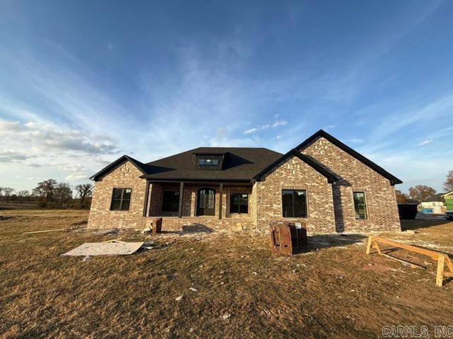 What a beautiful view from the front and back of your home! The views of the sunsets in this subdivision are unmatched. You can enjoy them while sitting on the massive back porch. You even have cows grazing in the pasture behind the home. The home has been thoughtfully designed with large windows overlooking the large backyard. The living room and kitchen are open concept with a nice dining space as you come in the front door. The kitchen has a large island for cooking and entertaining with lots of storage. The pantry is also huge. The primary bedroom is separate from the guest bedrooms. The bathroom has double vanities separated by the door, double entry shower, soaking tub and two closets. You will appreciate the storage in this home. Come see this home in a fabulous subdivision North of Greenbrier. Completion is expected at the end of December.