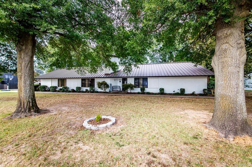 Great Family Home. Reasonably Priced at $92 per sf.  Wood floors through out with tile in the wet areas. 4 Bedrooms, 3 Baths, Granite in the kitchen with breakfast bar which opens to the great room with fireplace with dining room near by.  if that isn't enough a 1500 sf shop with man cave.  It is a must see.  Call for appointment. 501-842-3928