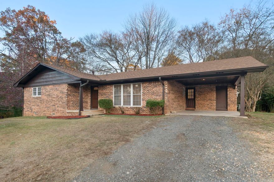 This beautifully updated home combines modern style with exceptional convenience. You'll enjoy being just moments away from top-rated schools,  parks, and various dining options.   Inside, no detail has been overlooked. The spacious layout has been completely updated...features fresh paint, brand-new flooring, and stylish new light fixtures throughout, creating a bright, inviting atmosphere. The kitchen boasts sleek stainless steel appliances, elegant quartz countertops, a beautiful tile backsplash and a convenient coffee nook or the perfect place to place your microwave—ideal for preparing meals and entertaining guests.   A standout feature is the expansive recreation room complete with a closet. This versatile space can be used as a home theater, playroom, game area, or even a fourth bedroom—creating a great space for relaxing or hosting family and friends.   For added convenience, the home also includes a garage and a covered carport, providing plenty of parking space.  This home truly offers the best of both worlds: updated modern living and a location that can’t be beaten! See it today—this gem won't last long!