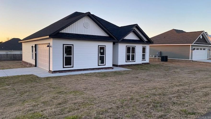 205 Doe Trail is a beautiful brand-new construction home, nestled within a gated community at the Grant County/Saline County Line. This home offers the perfect blend of elegance and modern comfort. The stunning 3-Bedroom, 2-Bathroom home is perched on a spacious corner lot, providing ample space for outdoor activities and relaxation. As you arrive, you'll be greeted by a side entry garage, adding to the allure of the property. Step inside to discover tall ceilings, an open floor plan, and upgraded features including custom cabinets, granite counter tops, and lots of crown molding. This home also provides access to some of the best schools in the state and has quick access to Little Rock, Pine Bluff, Sheridan, and other nearby cities. Contact us today to schedule a tour of this beautiful home.