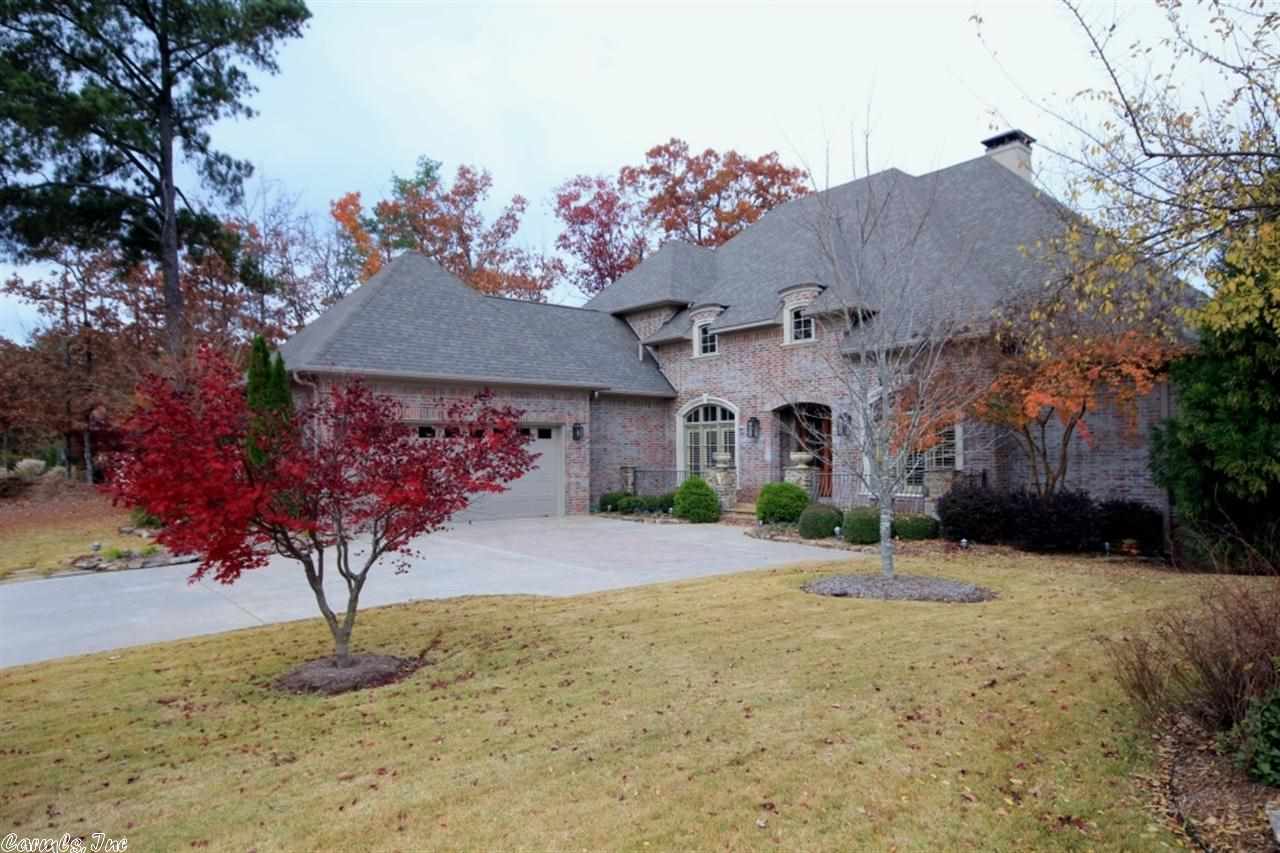 Truly incredible custom built home overlooks Bear Den Golf Course. Spacious open rooms and living spaces, high ceilings, elegant details & trim work. Master suite down, 2BR/2BA up. Large covered porch provides outdoor entertainment and views. Many extras. Light, Bright, Perfection!!