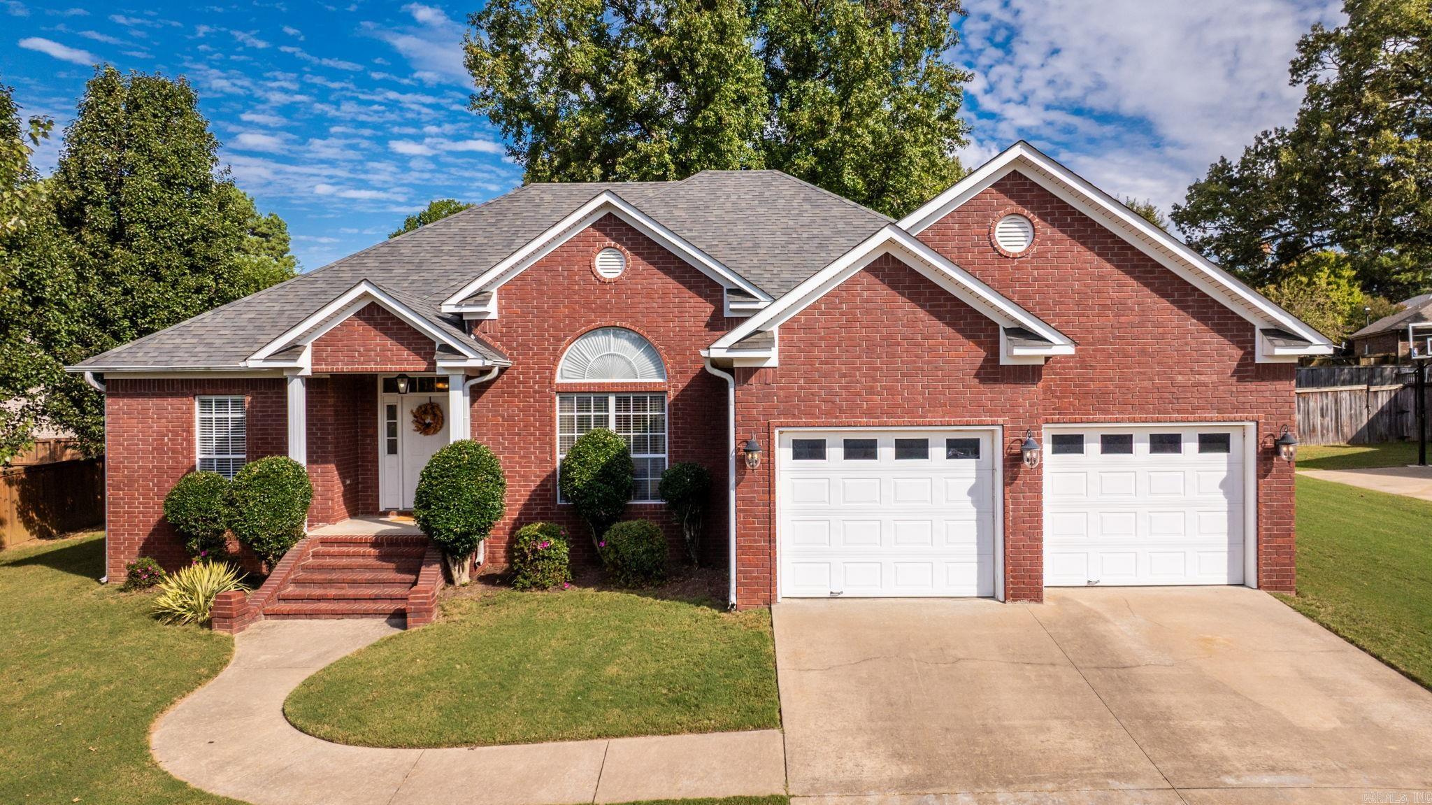 Location is key for this home right in the heart of Greenbrier with easy access to everything and in a sought after neighborhood. This low maintenance home has hardwood flooring and tile throughout with fresh paint and updated kitchen and laundry room. The kitchen features a bar with seating, quartz countertops with new sink and faucet and plenty of countertop workspace. The laundry room is spacious with quartz countertops, abundant cabinets, a sink and shares the half bath. Another great feature is oversize 2 car garage with side entry door and fabulous stairway with easy access for storage without pull down. Split floor plan, large primary bedroom with 2 closets and walk in shower. Nice manicured yard with a fully fenced backyard. ROOF 2021.