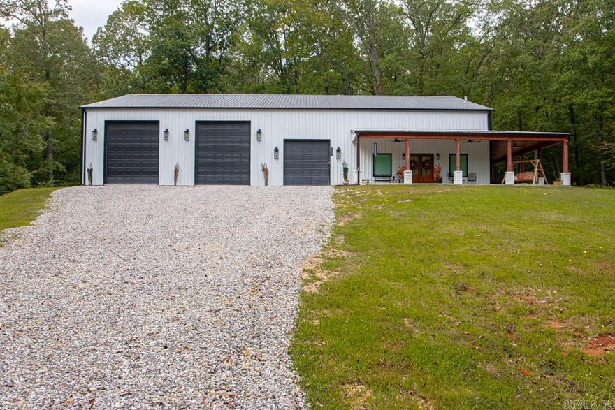 WOW ..... WELL DESIGNED BARNDOMINIUM THAT STATES QUALITY AND DESIGNED FOR COMFORT.... Amenities Include: Approximately 2542 Square Feet, 2 Bedrooms, 3 Bathrooms, Living / Dining Combo, Kitchen / Dining Combo, Breakfast Bar, Large Kitchen Island, Pantry, Abundance of Cabinets and Chef's Kitchen ( Wall Oven, Microwave, Drop in Gas Range ), Spacious Living Room with Gas Log Fireplace, Large Primary Bedroom with Large Walk-in Closet, Primary Bathroom with Custom Tile Shower and Free Standing Tub, Upstairs boasts bedroom with Walk-in Closet and Full Bathroom, Loft Area that overlooks the downstairs, 59' x 60' foot shop area with 2 - 12' wide x 14' tall garage doors and 1 - 10' wide x 10' tall garage door, Large Wrap around Sitting Porch/Patio with wood burning fireplace, entire Barndominium is spray foam insulation, all sitting on a private Tree Shaded 3.79 acre lot +/-. And Much More... A Must See..