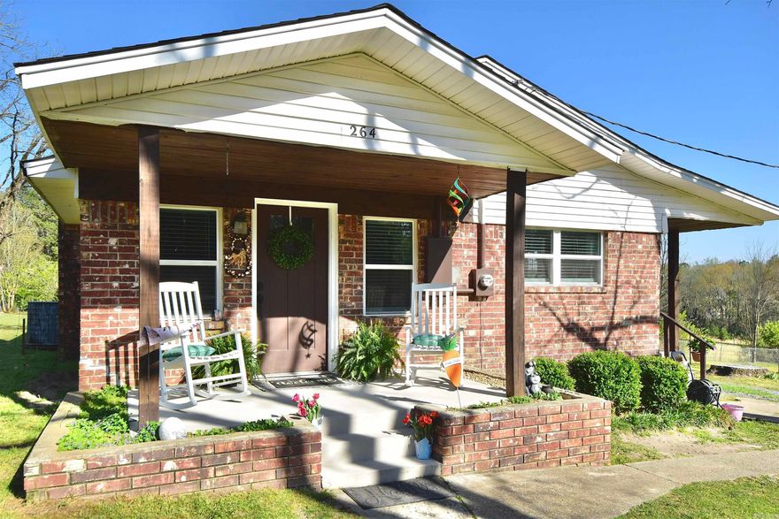 Welcome to 264 Sergeant Lane! This beautiful 3-bed 2-bath home features an open living, kitchen, and dining area with a pantry and island seating. Ideal for both everyday living and entertaining. Cozy wood-burning stove adds warmth and charm. Spacious bedrooms throughout, with a primary suite offering walk-in closets, dual sinks, and a walk-in rainfall shower. Dedicated laundry and mud room for added convenience. Enjoy outdoor living with front and side porches. A 24x24 shop with electricity is located outback, ideal for storage or a workspace. Additional exterior highlights include a newer roof (less than 3 years old) and a storm shelter. Don’t miss your chance to make 264 Sergeant Lane your next home!