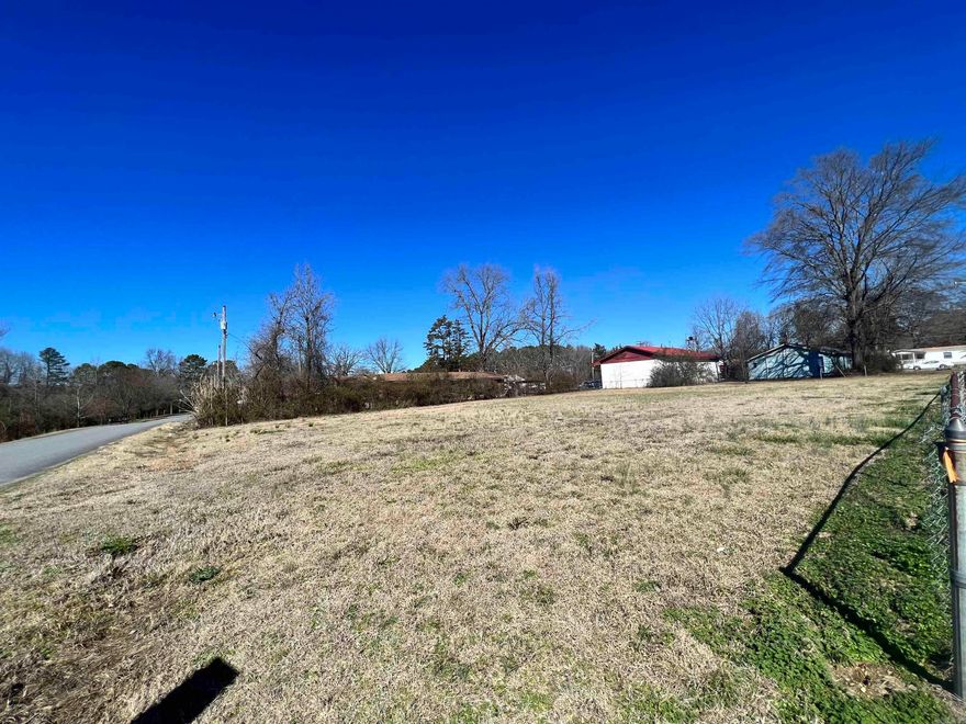 Multi use lot in the heart of Redfield with road frontage on both NE Railroad and S Brodie Street! Electricity, water, sewer on property. Perfect investment opportunity.