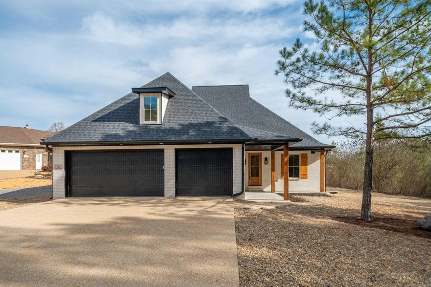 Beautiful NEW CONSTRUCTION home on Isabella Golf Course.  This inviting home has all of the features you are looking for.  Open floor plan wtih custom buitins through out. Double island in the kitchen perfect for meal prep and entertaining. Primary suite includes large walk in closet with custom drawers and shelves.  The primary bath is a beautiful space with a walk in shower. Front porch and back porch perfect for your morning coffee.