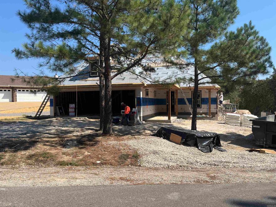 Beautiful NEW CONSTRUCTION home on Isabella Golf Course.  This inviting home has all of the features you are looking for.  Open floor plan wtih custom buitins through out. Double island in the kitchen perfect for meal prep and entertaining. Primary suite includes large walk in closet with custom drawers and shelves.  The primary bath is a beautiful space with a walk in shower. Front porch and back porch perfect for your morning coffee.