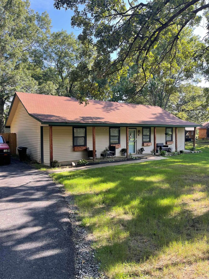 This home is the perfect starter home or investment right off Hwy 64 and has been renovated over the last couple of years by the home owners both inside and out.This property has been thoughtfully updated, both inside and out, to provide a fresh, turnkey living experience. New fully fenced in backyard with driveway access, along with two storage sheds. Recently serviced HVAC, new hot water heater, new fridge and washer/dryer. New roof in 2021 and new carport.