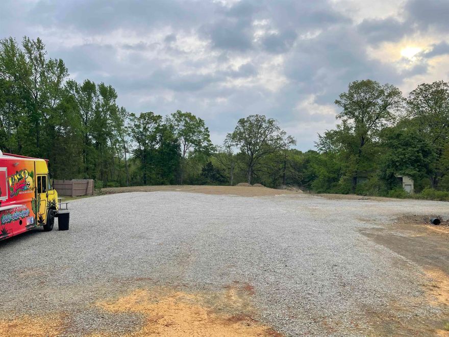 Prime commercial opportunity on Highway 16 with 100 feet of road frontage- right in the heart of downtown Pangburn and next door to Dollar General. This property has already been cleared, leveled, and prepped, making it ready for immediate use. A food truck is already operating on-site, and the location offers excellent visibility and traffic flow for additional food trucks or small businesses. Little Red River access is just ten minutes away and only twenty minutes from Greers Ferry Lake. This property has endless potential! Make it yours today!