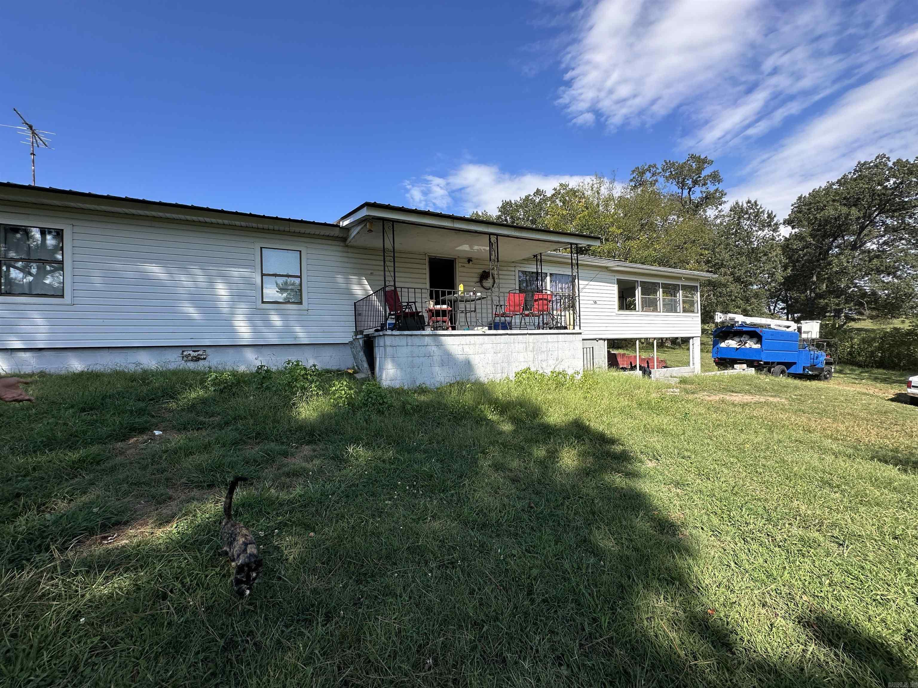 Welcome to 7429 Watts Road in Harrison, AR! This charming 2 bedroom, 1 bath home sits on 2 beautiful acres, offering both privacy and space to enjoy the outdoors. Inside, you'll find a comfortable floor plan, spacious living area, and a kitchen ready for your personal touch. The acreage provides room for a garden, hobbies, or simply relaxing in a peaceful country setting while still being just a short drive to town. There are also a few RV spots or room for extra homes since its unrestricted. A great opportunity for those looking for a home with land in the Harrison Area!