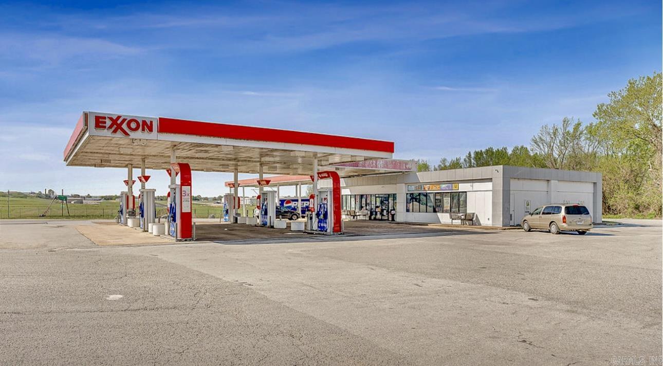 Well-Established Truck-stop with Prime Location! This profitable Exxon Tiger Mart truckstop offers a fantastic opportunity with 1.23 acres of prime real estate, located on a high-traffic route. The property features a 3,060 sq ft heated and cooled convenience store, grocery section, fuel pumps, and diesel bays. With solid financials available under an NDA, this investment offers great potential for continued growth. Perfectly suited for those looking to expand their presence in the retail, convenience, or transportation sectors. The property is situated on a 43,560± sq ft lot, providing ample space for operations. A must-see opportunity for investors!