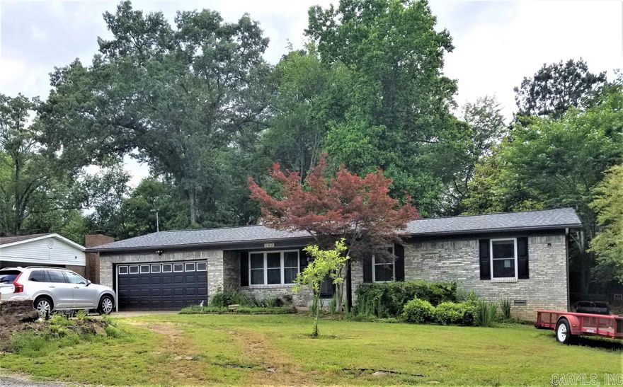 BRICK HOME WITH 2 CAR GARAGE - VINYL WINDOWS - UPDATED THROUGHOUT - LARGE GAME ROOM - PRIVATE OUTDOOR COVERED HOT TUB - RECREATIONAL BONUS ROOM - FENCED BACK YARD - STORAGE BUILDING - ALL ON A LEVEL LANDSCAPED LOT IN LSSD - CALL FOR A SHOWING TODAY!