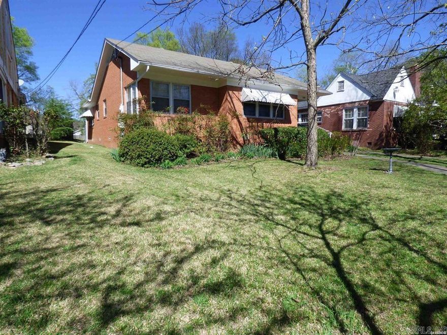This adorable all-brick home blends classic charm with modern comfort, offering a clean, well-kept interior and several thoughtful upgrades throughout. The layout is bright and welcoming, with a move-in-ready feel that makes settling in effortless. Outside, you’ll find a level, fully fenced yard—perfect for pets, gardening, or simply enjoying the outdoors—along with a versatile shop for storage, hobbies, or extra workspace.  Centrally located and within easy walking distance to downtown Hot Springs, this home puts you close to restaurants, shops, and local attractions while still offering the peace of a quiet neighborhood. A rare combination of convenience, character, and functionality, this property is truly a gem.