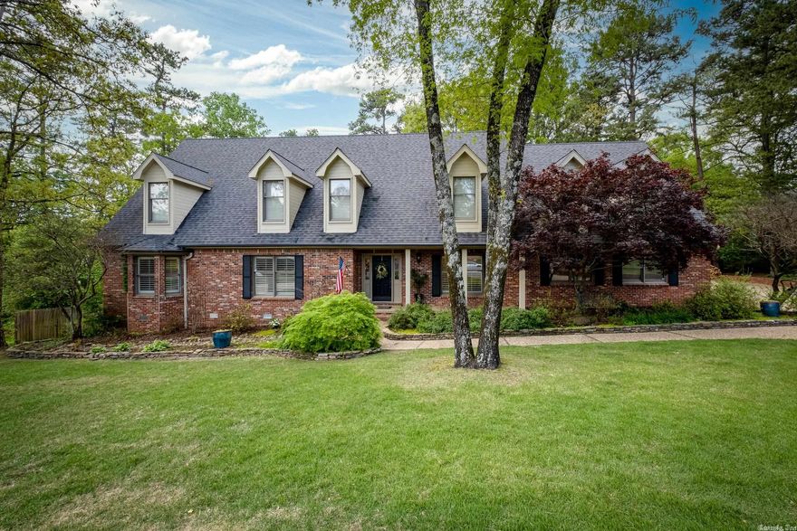 Private setting, cul-de-sac Don Roberts Elementry Beauty! Versatile floor plan with exceptional outdoor living. 20'x30' cozy screen porch complete with fireplace, deck for grilling. Wide plank hardwoods, plantation shutters, built-ins galore, oversized bedrooms. Stainless appliances, granite, island, sitting area in kitchen. Study/nursery and laundry connect with master! Dual staircase, theater, hobby room/kids study. 24'x24' attic space/gym (not included in Sq Ft). Sprinkler, 3 car side load garage. Family home - Elegant but cozy.