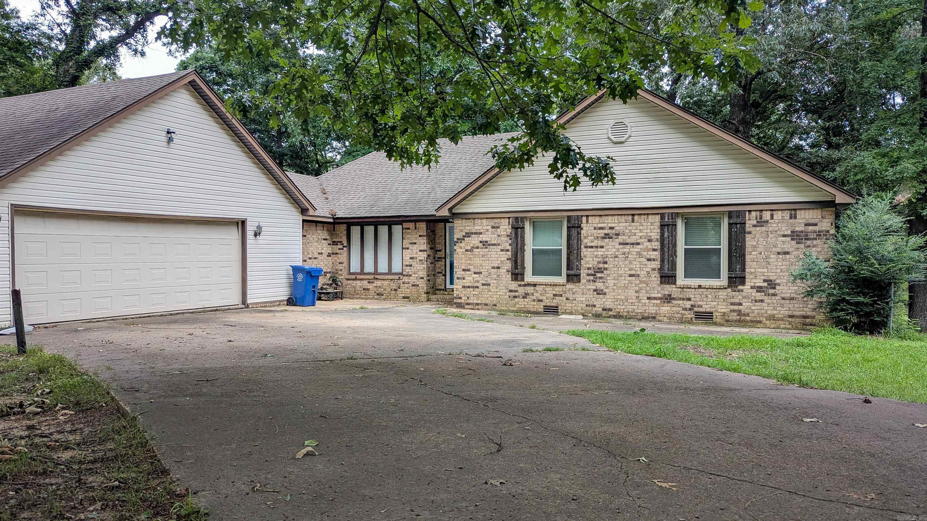 Discover the perfect blend of space, style, and serenity at 3012 Oakridge Dr in Jonesboro, AR. Located in the sought-after Nettleton School District, this 4-bedroom, 3-bath home spans 3,218 sqft and features a finished basement offering endless flexibility—ideal for guests, hobbies, or a second living area. Enjoy the luxury of granite countertops in the kitchen and all bathrooms, complemented by smart lighting and a cozy wood-burning fireplace. Recent upgrades include 2022 flooring and a thoughtful layout with abundant storage. Outside, the 0.76-acre lot invites you to relax beneath mature trees or enjoy fishing in your private corner of a shared stocked pond. Deer often visit, adding charm to the peaceful setting. With CWL utilities and just a few cosmetic touches left to personalize, this home delivers comfort, nature, and character—all waiting for your next chapter to begin.