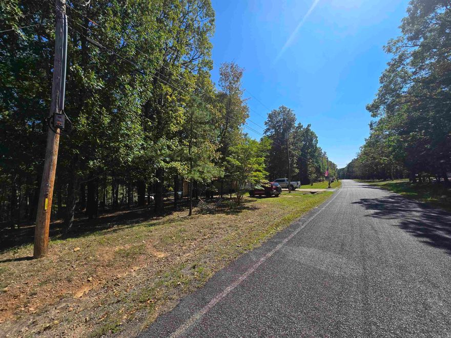 Discover the perfect opportunity to create your dream home or weekend getaway in the charming Ozark lake town of Fairfield Bay, Arkansas. This residential lot provides plenty of space to design and build the home you've always envisioned. Situated just minutes away from the Fairfield Bay Marina and Greers Ferry Lake, you'll have access to endless water-based activities such as boating, fishing, swimming, Fairfield Bay also offers 3 communities pools, mini golf, bowling, pickleball, tennis, restaurants, hundred miles of ATV & hiking/biking trails and so much more Embrace the tranquil atmosphere and breathtaking natural beauty of the Ozarks as you design you forever home or plan your weekend retreat. Don't miss out on the chance to be part of this lake town community, where the beauty of nature merges seamlessly with modern amenities and a relaxed lifestyle. Owner may offer owner finance.