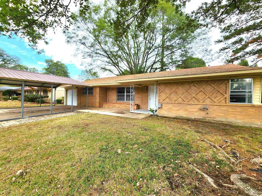 Lots of updates in this brick 3 Bedroom, 2 Bath home in Country Club Terrace! This home has a 1 car garage with a bonus storage/workshop area, 2 additional storage buildings, and a detached carport. All kitchen appliances including washer/dryer will remain.  New Roof- 2024 New Kitchen Appliances including Washer/Dryer- 2024 Bathroom renovations- 2024 Updated flooring and paint in most rooms