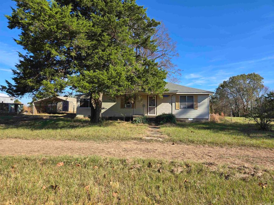 Take a look at this! Enjoy the tranquility of this country setting. Bring a few tools and make this home the perfect place! Sitting on over an acre of land and plenty of room for a small garden! Sold as is. Agents see confidential remarks.