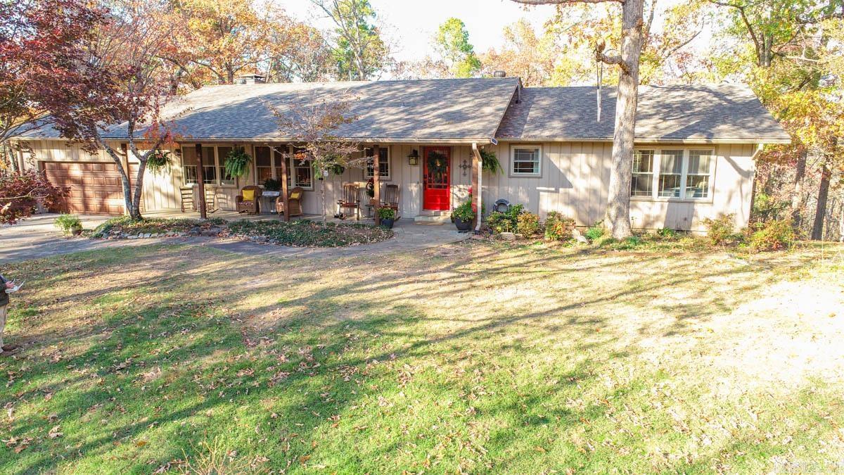 BACK ON THE MARKET DUE TO NO FAULT OF THE SELLER. This beautiful home on 9.81 acres has it all! Level area at the road with established and fenced organic garden with room to park a RV and beautiful views from the house. Many updates including a new roof in 2023, new HVAC in 2020, 24 W whole-house generator, gorgeous hardwood floors throughout, new doors and hardware, beautiful kitchen cabinetry with pull-out drawers, lots of built-ins and plenty of storage. Arlo outdoor cameras, security system, and gated entrance. Enjoy this country setting complete with koi pond, chicken coop, fire pit area, tree-house perfect for the kids, barn/shop with electricity that can be used as an art studio. Too many great things to list - schedule a tour today!