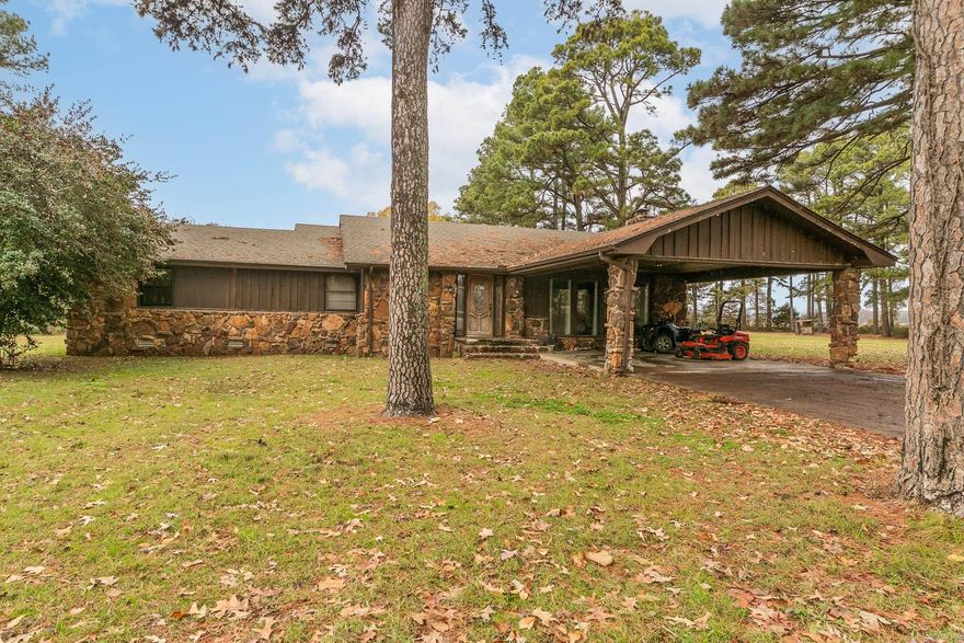 Welcome to your idyllic countryside escape! Nestled on 8.28 tranquil acres, this 2,214 square foot home offers the perfect blend of rustic charm and modern comfort. Ideal for families seeking a peaceful retreat or investors looking for a promising opportunity, this property promises a lifestyle of relaxation and serenity. With 2,214 square feet of living space, there's plenty of room for everyone to enjoy. The open floor plan provides a warm, inviting atmosphere, perfect for gatherings or quiet evenings in. Cozy up by the woodburning fireplace, a perfect spot to unwind after a long day, adding a touch of warmth and comfort to the home.This home has seen thoughtful updates since its last sale, ensuring a blend of classic charm and contemporary style. Currently undergoing a transformation, the master suite will soon feature beautiful wood flooring, creating a luxurious and inviting sanctuary.The stunning stone exterior not only enhances the home's aesthetic appeal but also offers durability and low maintenance. Don't miss the chance to own this charming country retreat! Schedule a viewing today and experience the tranquility this home has to offer! Check agent remarks before showing