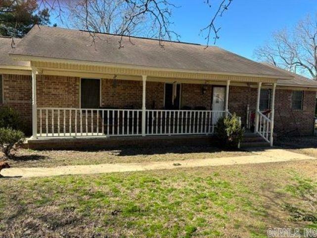 Great mini farm with 4 bedrooms 2 bath home. Has office and 6.43 acres. Fenced and has a 56x60 barn and a pond.