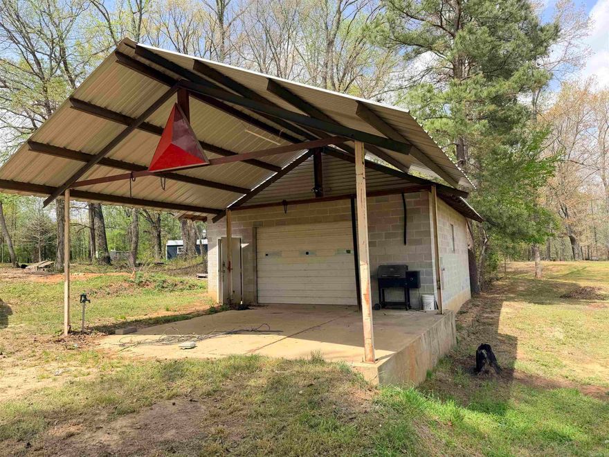 Discover the perfect blend of functionality and opportunity with this unique property situated on just over an acre on highly sought Campground road in Austin AR!  Whether you're looking to build your dream home, run a business, or need extra workspace, this property checks all the boxes!  Outside the city limits with no restrictions yet close to town, this property features two work shops, one is 1600 sft and the other is 750 sft with one being cinder block construction and the other a metal building.  There was a mobile home that has recently been removed so utilities are ready to hook up if looking to build a home or would make a great spot to park an RV!  Call your agent to check it out and make this home!