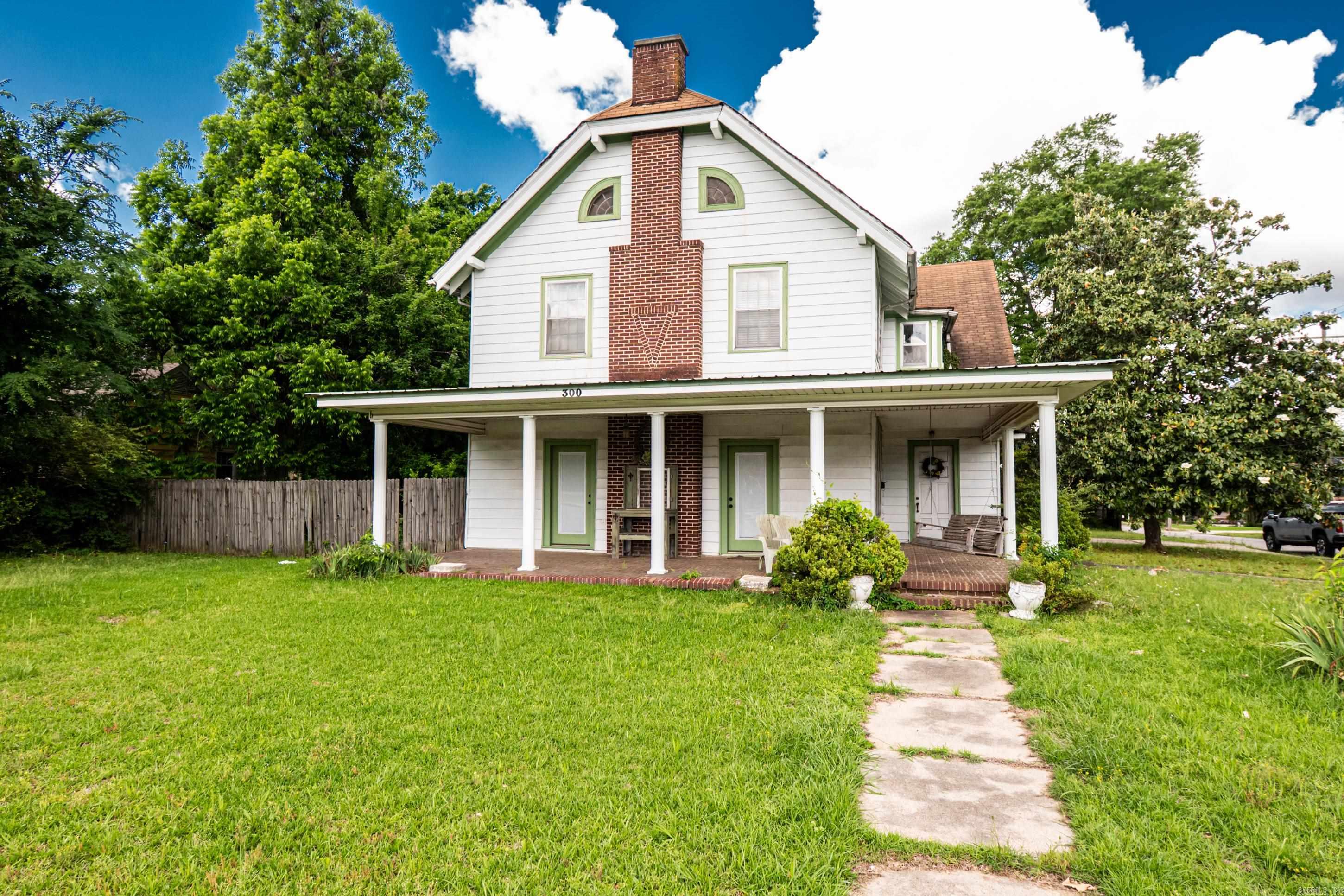 This historical French home on a corner lot of Main Street is very spacious and has a ton of character. The old home has big bedrooms, split level staircase, a butlers staircase, hardwood floors and lots of natural light. The property also comes with a rental property or extra home that is 2 bed/1 bath. The corner lot calls for convenience and easy access to town. Come check out this home and all of the possibilities it has to offer.