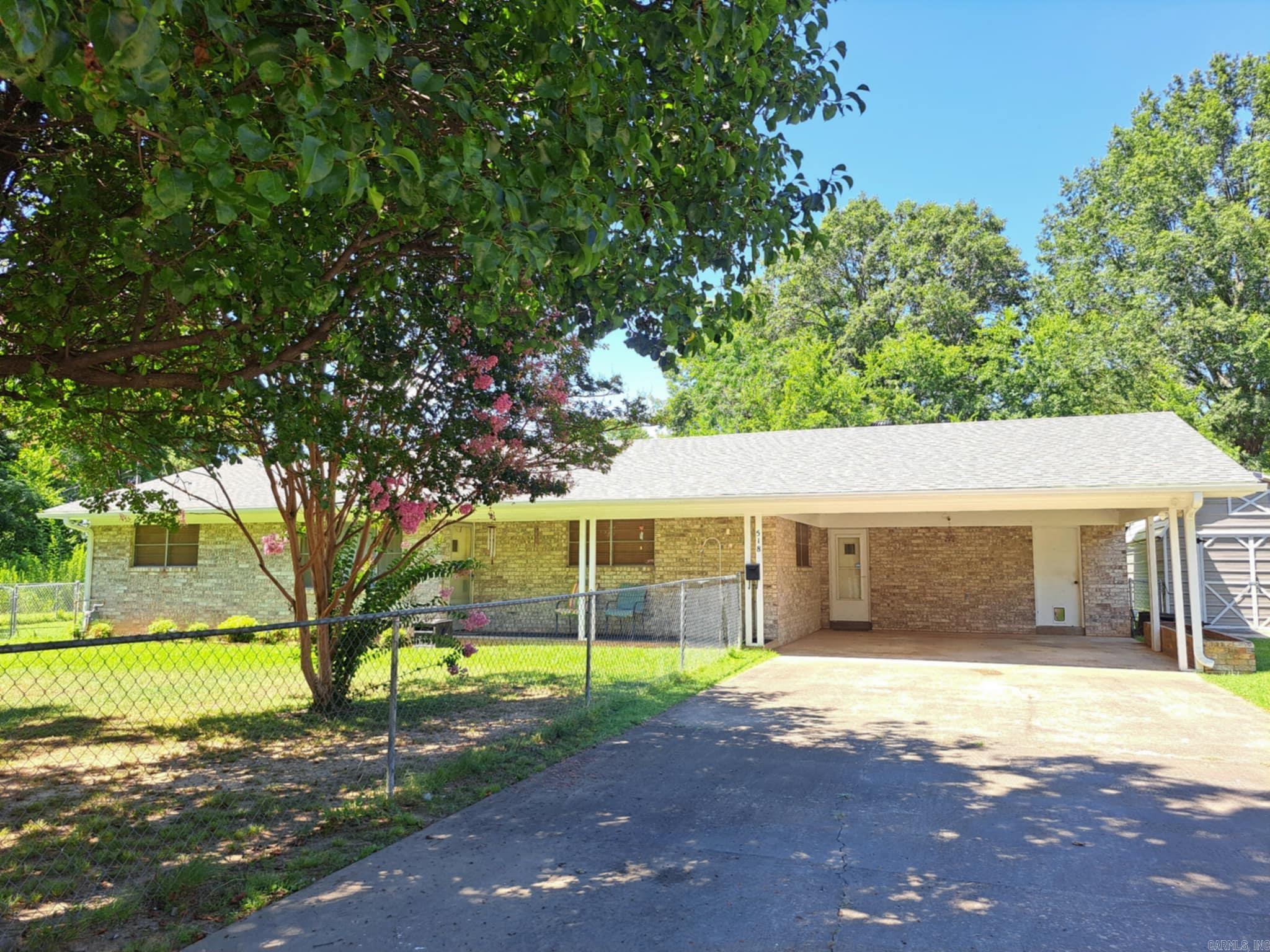 New roof in 2025, new HVAC in 2022, and new water heater in 2020. With some cosmetic upgrades, this home is ready to have quick equity. The large kitchen is open to the living room, and there is an amazing amount of storage areas and closets, which are pretty rare for a house built before 1990. Outside is a huge, fully-fenced yard, and two sheds (one shed is already wired with 240 volt, 120 volt, and lighting). There are two Reolink security cameras attached to the house that will not convey. They are being used to keep an eye on the property before closing.