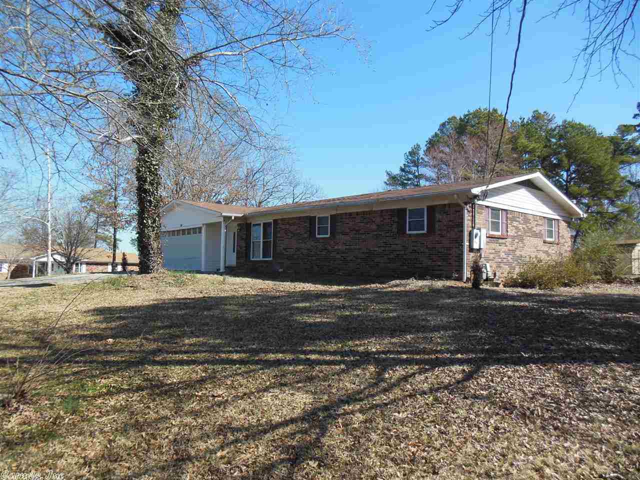 This one level brick home is Priced to Please! Don't miss seeing this updated home. Features include stainless appliances in the kitchen, hardwood and tile floors, modern bathrooms and beautiful fixtures throughout! Conveniently located on a large corner lot close to schools and eating.