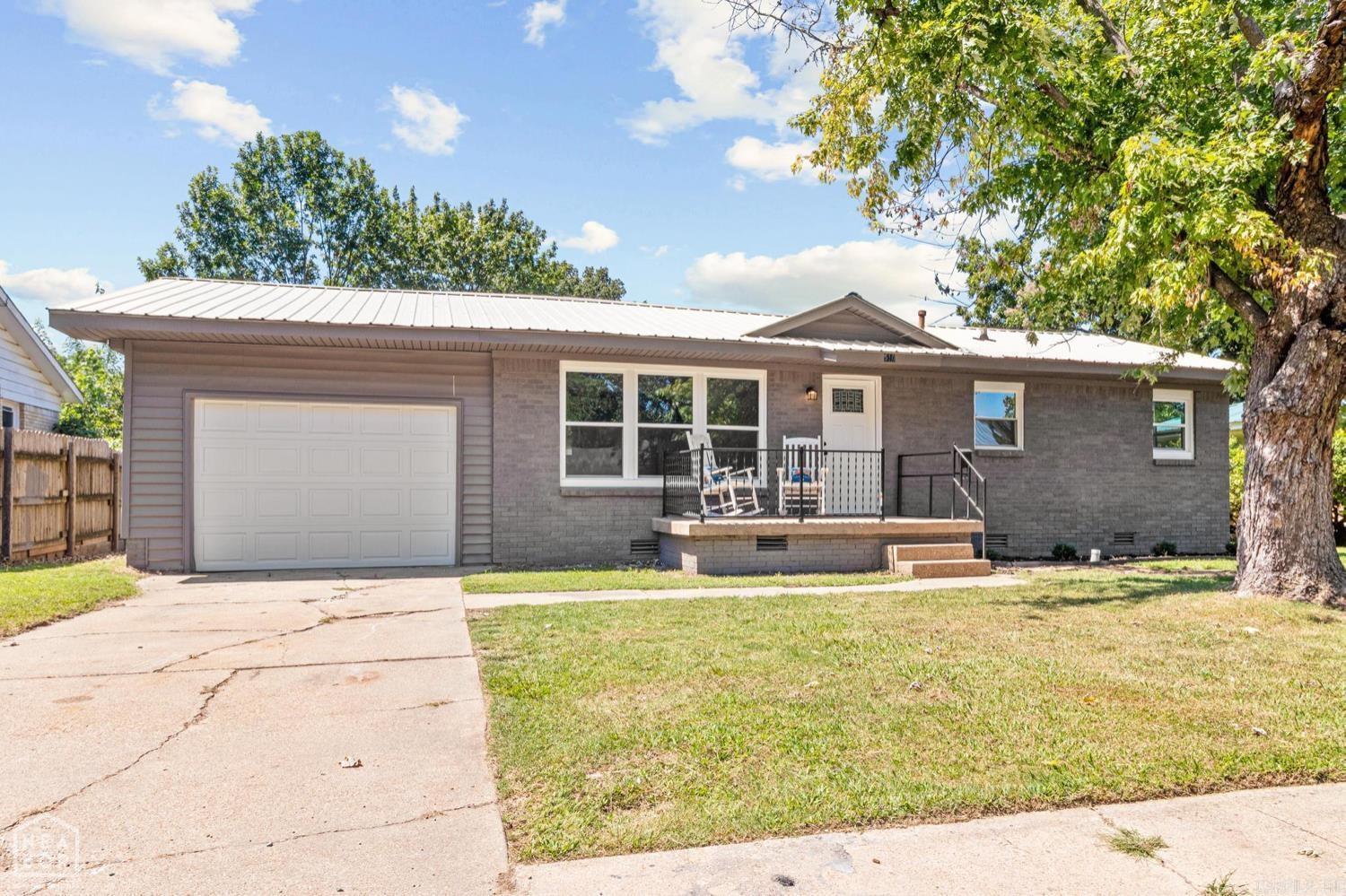 A unicorn has landed in Paragould! You will not find a more cute and updated home for this price on the market currently. At $124,900 you get a home with new water & sewer lines, new HVAC, water heater, plumbing, electrical, windows, doors, and crawlspace, all with a one year contractor warranty. Add in the new LVP flooring, black appliances, all new kitchen and bathroom, plus a newly added interior laundry room and the value is unmatched. Peace of mind is also included with a metal roof that has been inspected and updated by a licensed roofer. Not to mention IT. IS. SO. CUUUUTE! Large shade trees and a roomy backyard means the time spent outside is almost as enjoyable as it is inside. Check out the professional photos but just know that seeing it in person is the best way to really grasp what all this home has to offer for such a reasonable price.