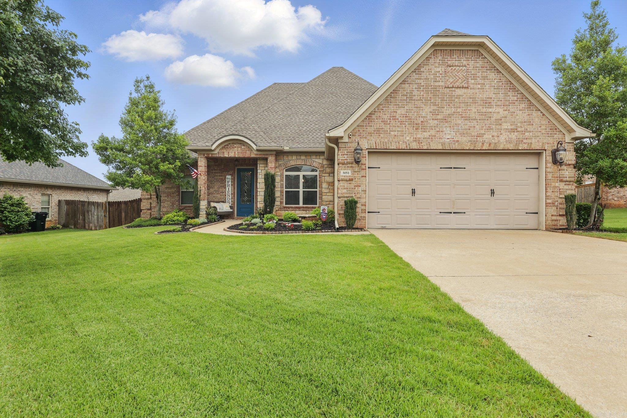 Charming and flexible floor plan in a prime Benton location—just a short walk to Springhill Elementary! This updated home offers 4 bedrooms and 2 bathrooms or 3 bedrooms with two spacious living areas, a bonus room, or a home office. In 2018, the upstairs was transformed with a dividing wall, new stairs, and flooring—creating a private space that could easily serve as a 4th bedroom, second living area, or office. Additional updates include a new roof and gutters (2024), back deck and patio (2018), and fully replaced back fence (2021). Inside, enjoy newer flooring in all bedrooms (2020), a high-efficiency 4-ton HVAC system with smart thermostat (2017), and an upstairs mini-split (2020) for year-round comfort. Great yard, tons of space, and located in a sought-after school zone. Don’t miss this one!