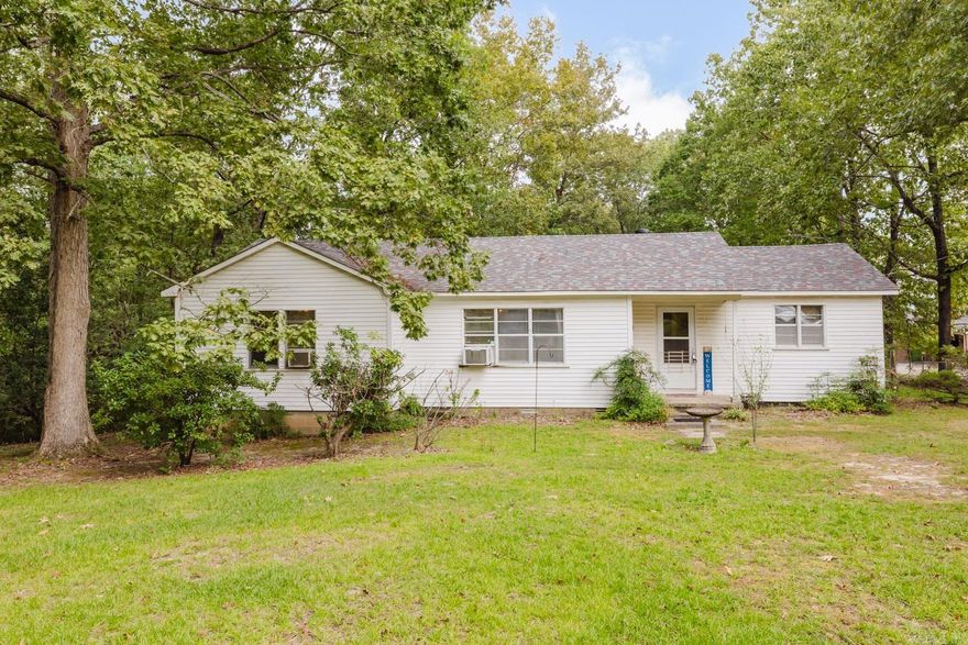 You have got to go check out this house, it has been loved for over 40 years by the same family and now they are ready to pass to baton to the new owner so you can begin making your own family memories.  It sits on 2 acres on a dead end road that is quiet and outside the city limits.  Walking in the front door, you can feel the love this house has had within it's walls.  With a little love and TLC, this house can be brought back to life and serve as a gathering place for you and your family and friends.  With plenty of mature hard woods on the property, the outdoor space is peaceful and perfect for gardening, cookouts and star gazing.  Although this space is very quiet and serene, don't let that fool you, it's minutes from all the things that keep you busy (work, dining, shopping and school).  Schedule your showing today before someone else discovers this little hidden gem.