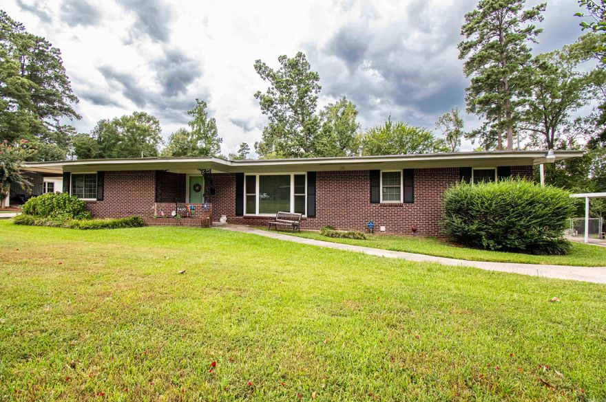 Welcome to 2410 Gale Place, located in the sought-after Racquet Club subdivision of El Dorado. This 3-bedroom, 2-bathroom home sits on a large lot and features a beautifully renovated kitchen, perfect for modern living. The wonderful sunroom, filled with natural light, offers a cozy space for relaxation. The property is fully fenced, providing both privacy and security. This home is the perfect blend of comfort and style—ideal for anyone looking to settle in a great neighborhood!